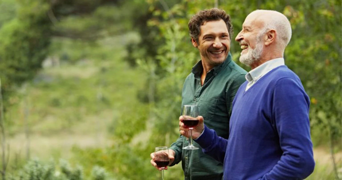 Father and son grab a glass of wine together for father's day. TAG Liquor Stores Canada | Beer, Wine, Spirits & Gift Baskets Canada-wide Delivery